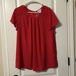 Red and white polka dot blouse